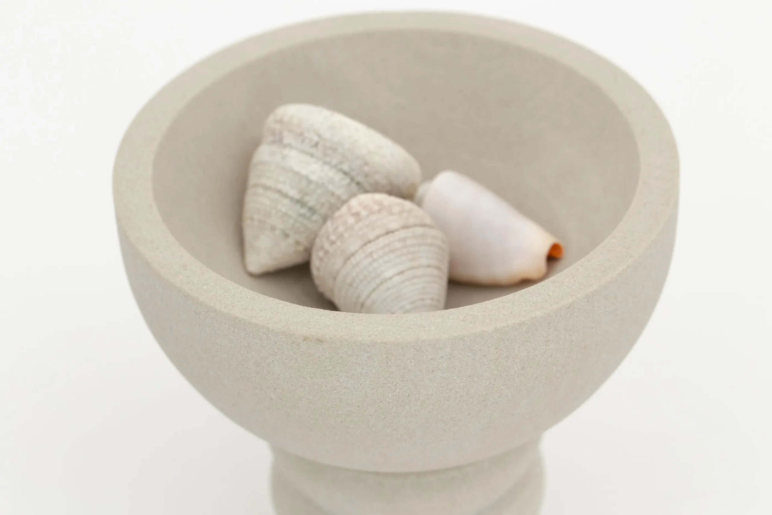 Flamant Costanza, Kom, Zandsteen