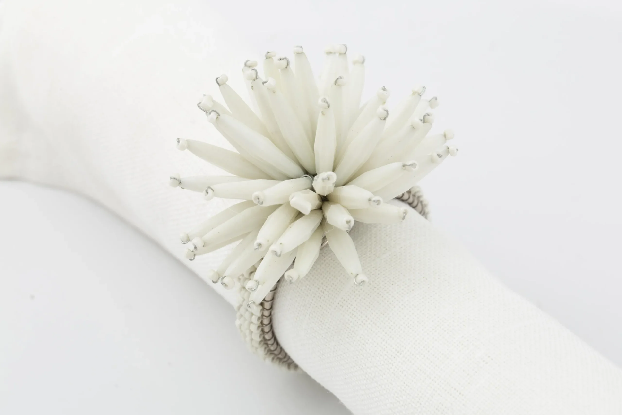 Flamant Parton, Servetring, Kralen