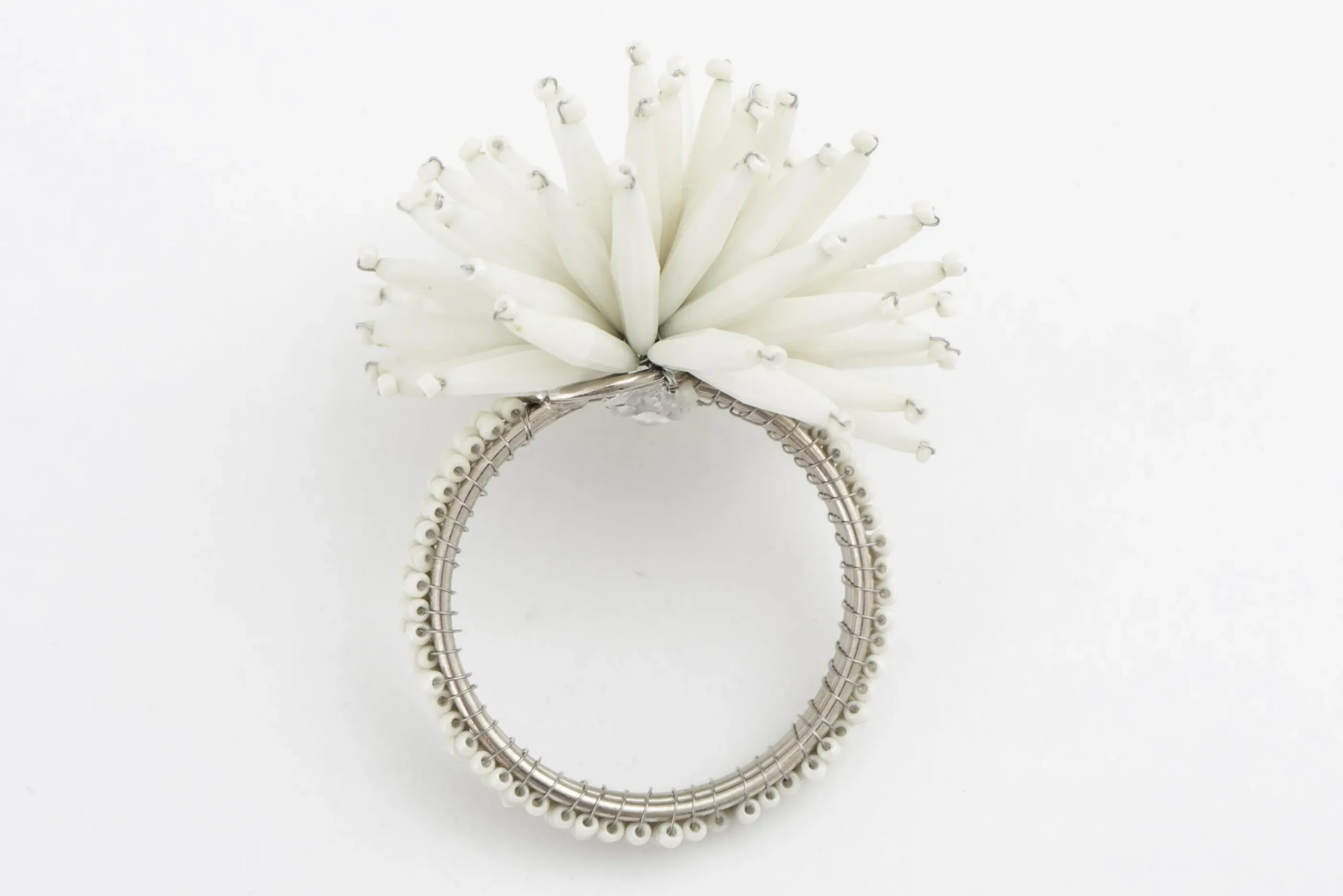 Flamant Parton, Servetring, Kralen