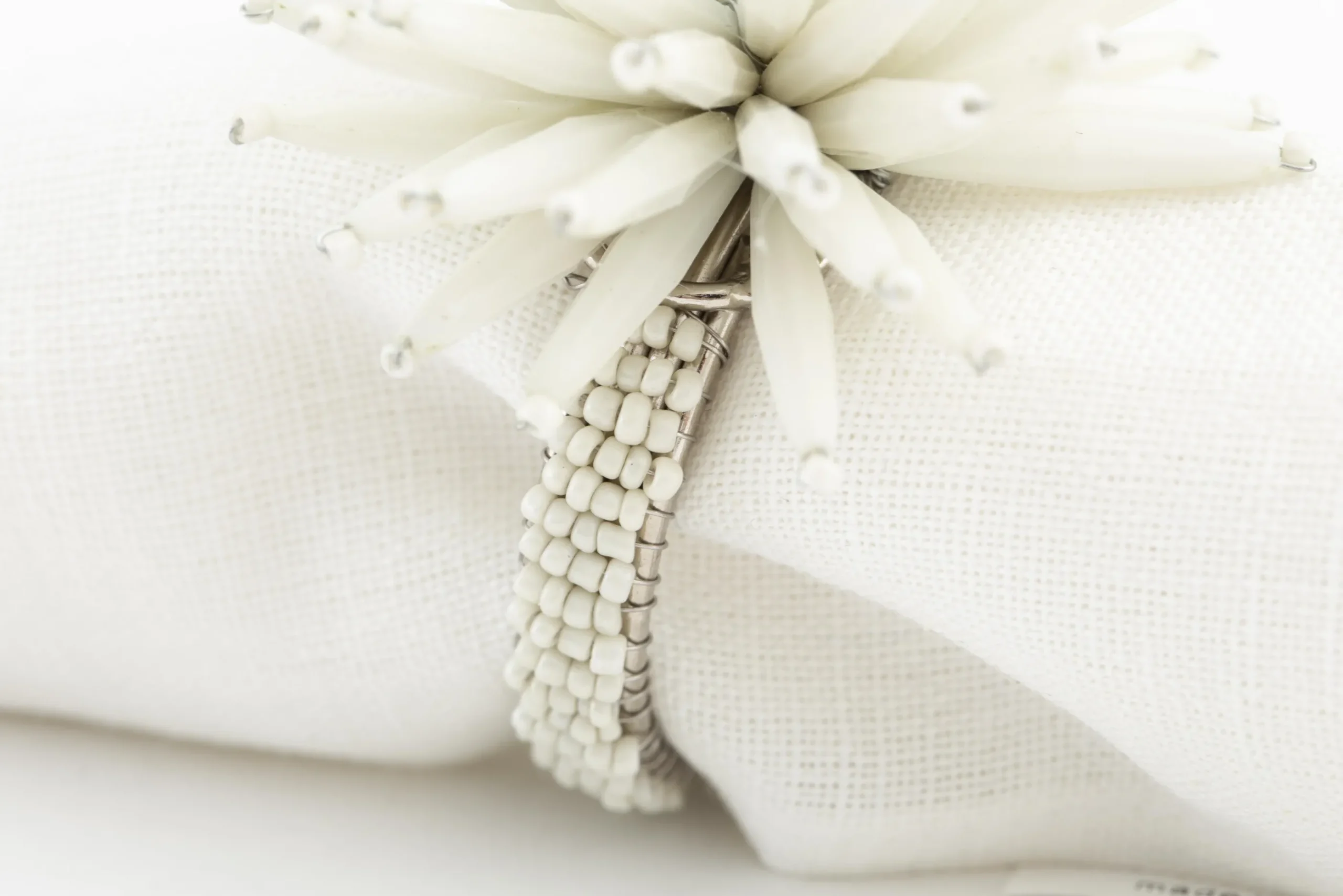 Flamant Parton, Servetring, Kralen