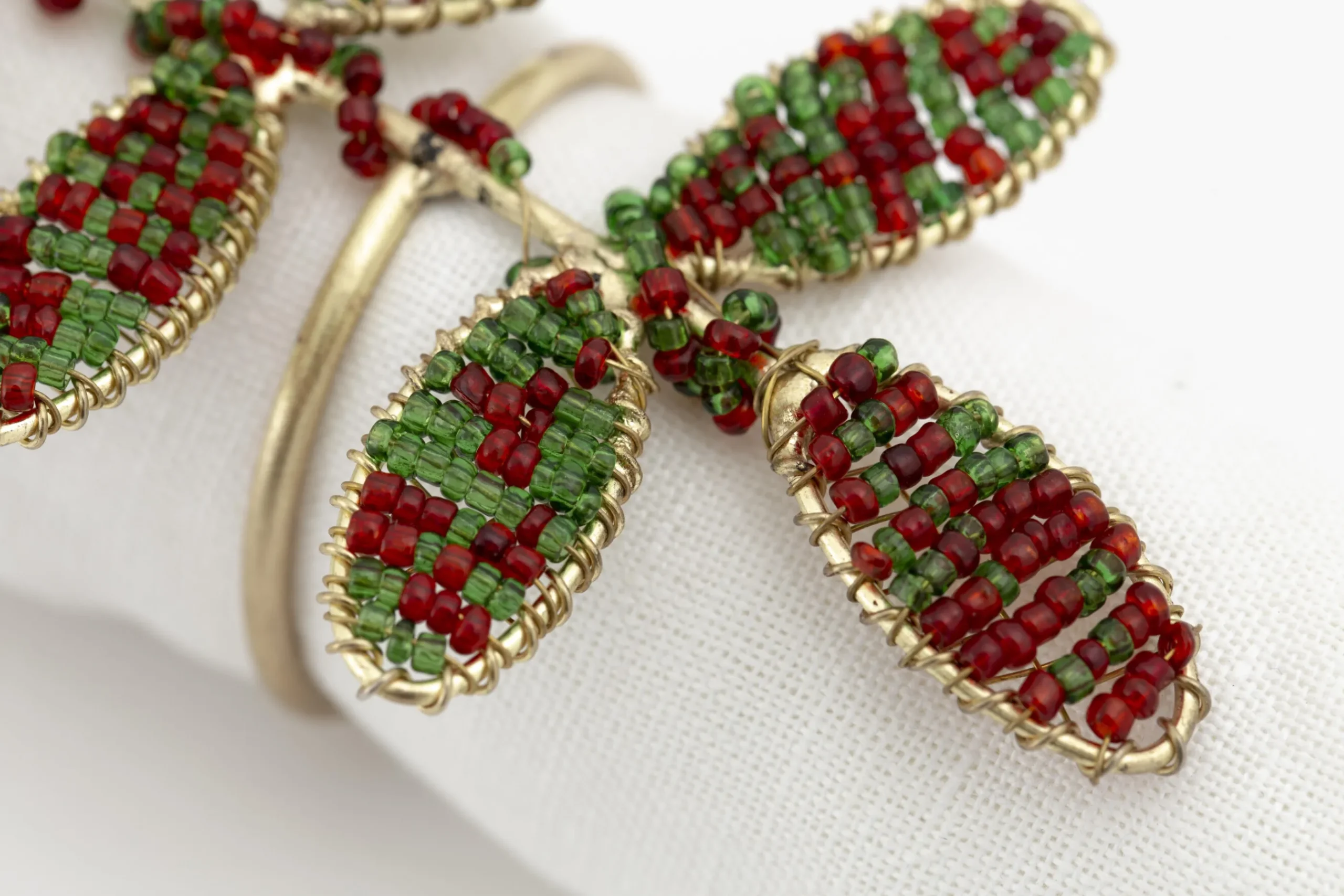 Flamant Rawas, Servetring, Kralen, Blad